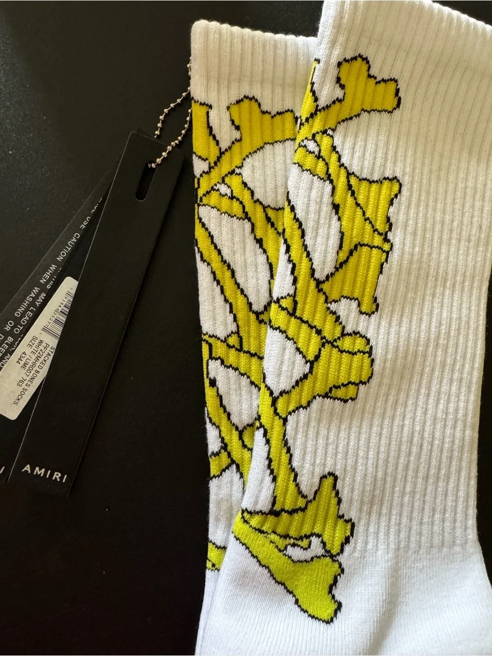 AMIRI lime stacked